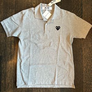 Men’s gray comme de garçons, short sleeve collared T-shirt size large